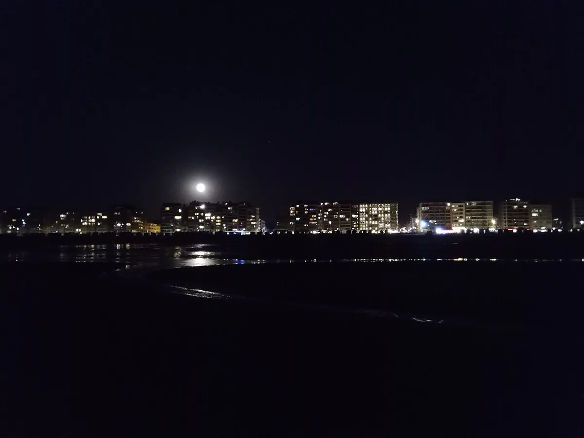 De Panne beach at moonlight, atmospheric evening view