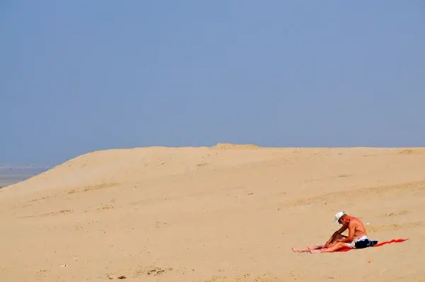 Koksijde beach with typical Belgian coast beach cabins