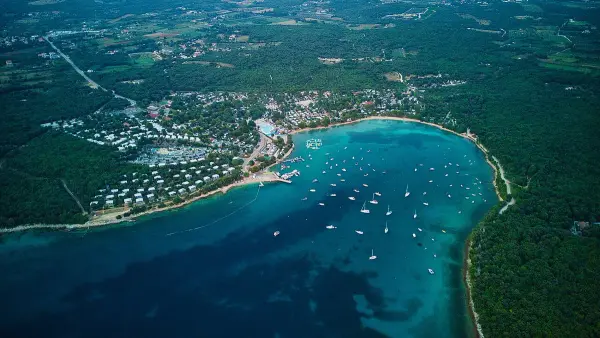 Sunset over a bay near Rovinj, Croatia with calm Adriatic waters