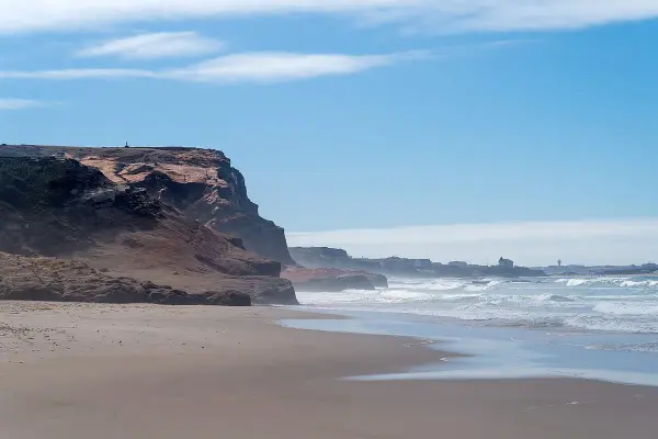 Praia do Portinho da Areia Norte sheltered cove dog beach in Peniche, central Portugal
