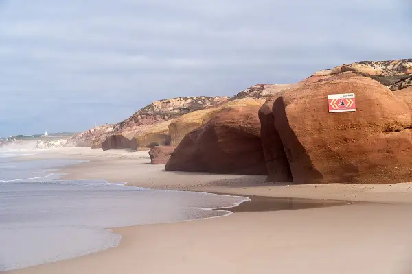 Praia do Portinho da Areia Norte sheltered cove dog beach in Peniche, central Portugal