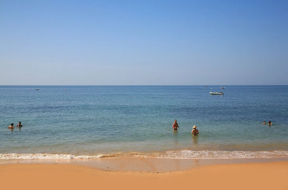 Praia da Baleeira sheltered cove beach inside Albufeira harbour, Algarve
